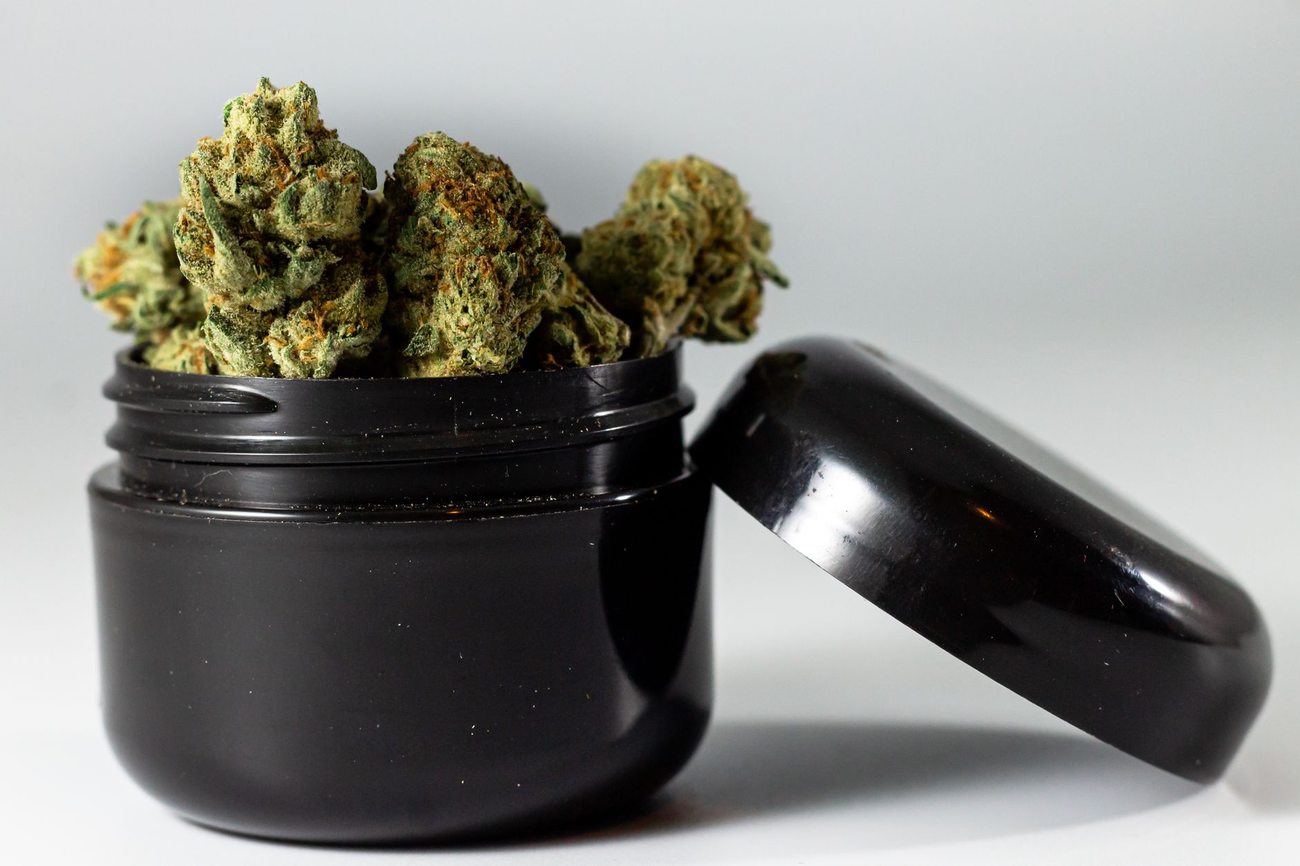 green kush on black ceramic bowl